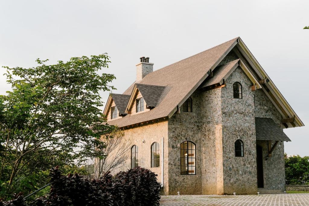 an old stone church with a gambrel roof at The Old Country Stone House in Cebu City