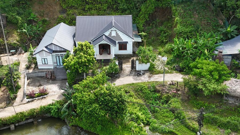 an aerial view of a house on a hill at Tay Na Bon Homestay in Ha Giang