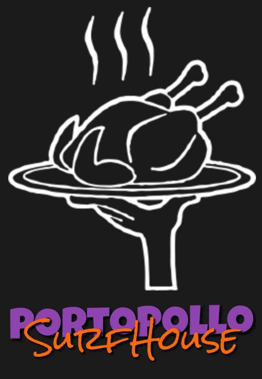 a sign with a chicken on a plate at PortoPollo SurfHouse C in Barrabisa