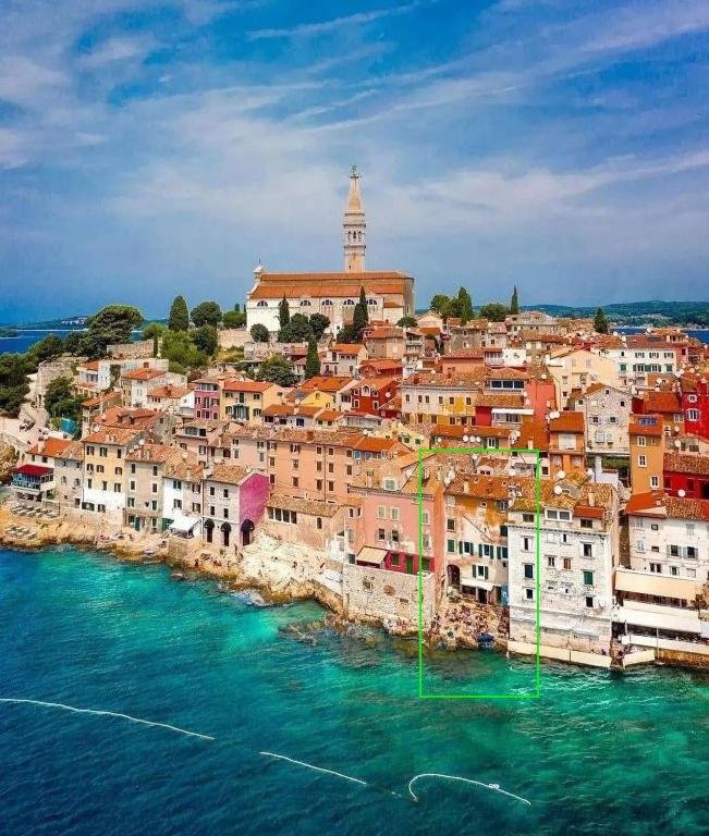 a view of a town on the water at Mediterraneo Seaview Apartments in Rovinj