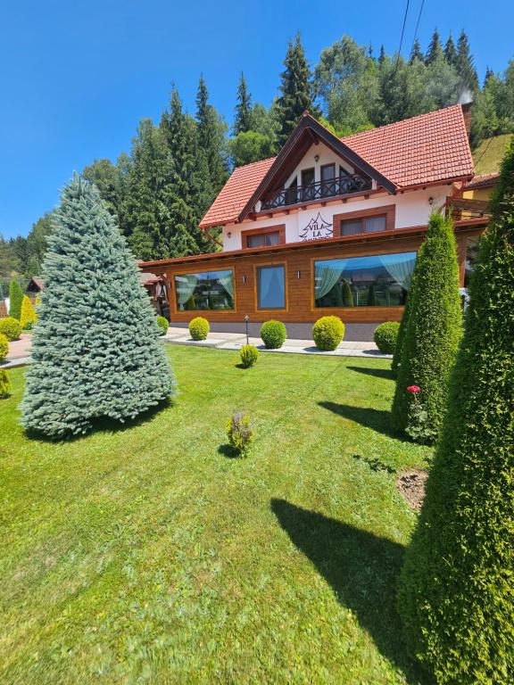 Vrt pred nastanitvijo Casa la munte