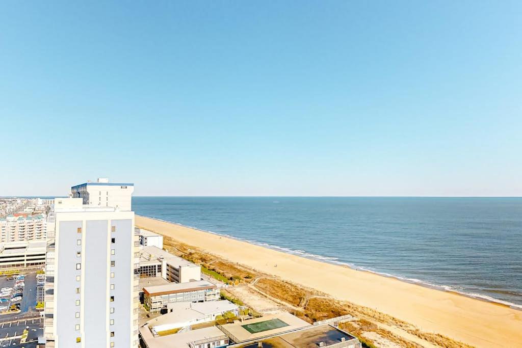 a view of a beach with buildings and the ocean at Sea Watch 1910 in Ocean City