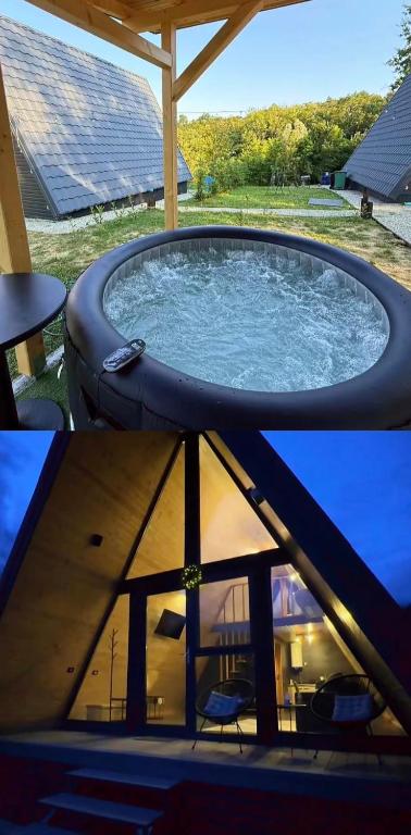 a large swimming pool on the roof of a house at A Frame Loft Calimanesti in Călimăneşti