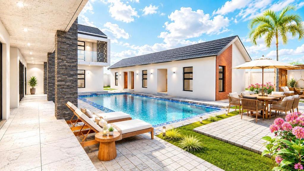 a house with a swimming pool and a patio at HMT Guest House in Thohoyandou