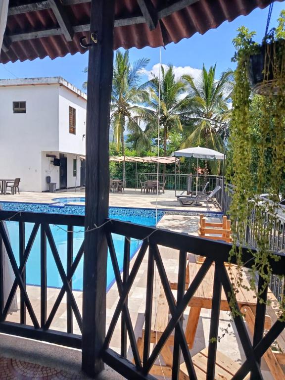 a view of the pool from the house at Naru CasaBlanca in Utica