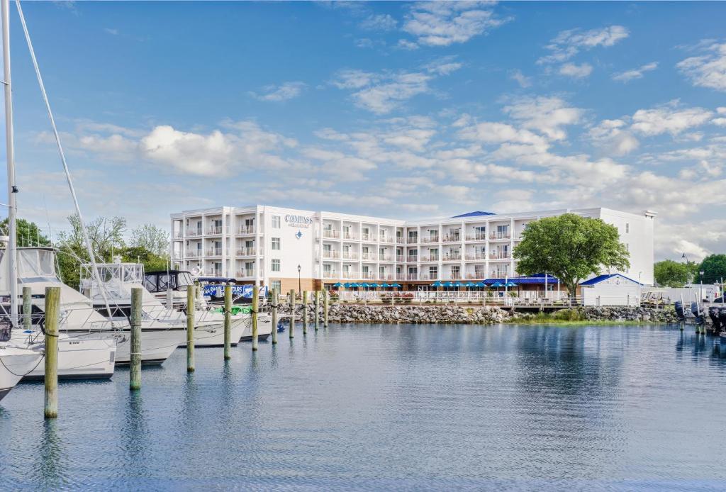 a hotel with a marina in front of a building at Compass by Margaritaville Beaufort in Beaufort
