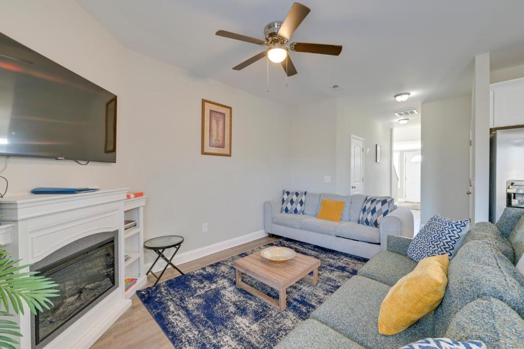 a living room with a couch and a fireplace at Great for Groups! 2 Centrally Located Concord Gems in Concord