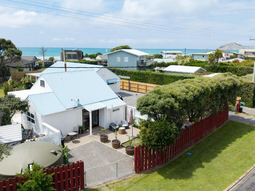 an aerial view of a house with a fence at Waimarama Coastal Getaway in Waimarama