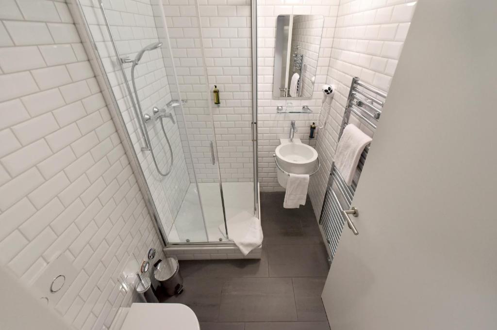 Koupelna v ubytování Hôtel Pax