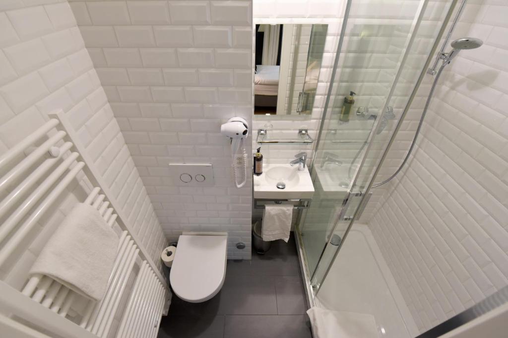 Koupelna v ubytování Hôtel Pax
