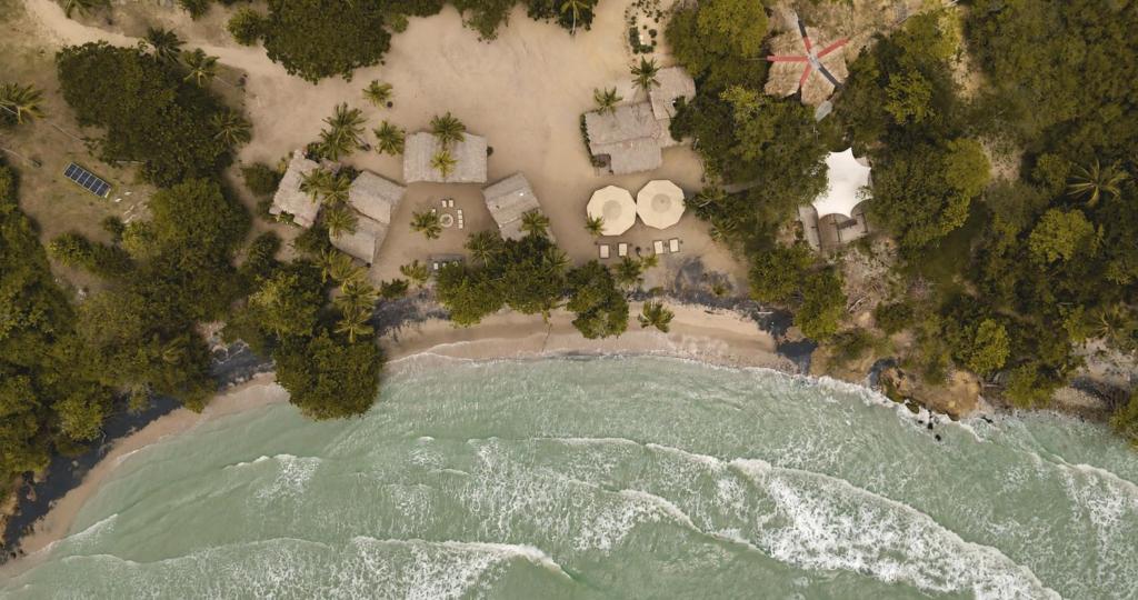 an aerial view of a beach and water at UNÚ Beach Hotel in Palomino