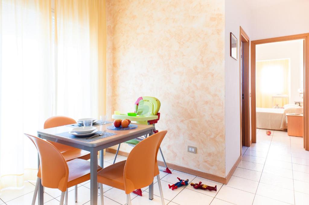 A bed or beds in a room at Welcome Residence per famiglie