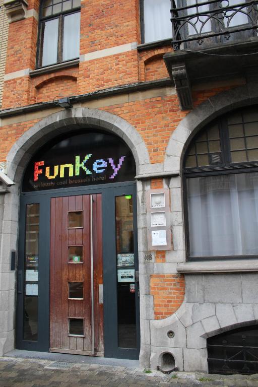 
a building with a sign on the front of it at FunKey Hotel in Brussels
