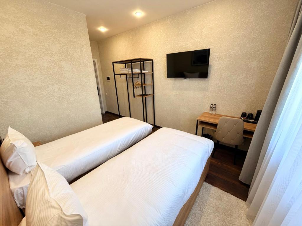 تصویر اتاق‌های TAU 28 Hotel - تصویر ۲