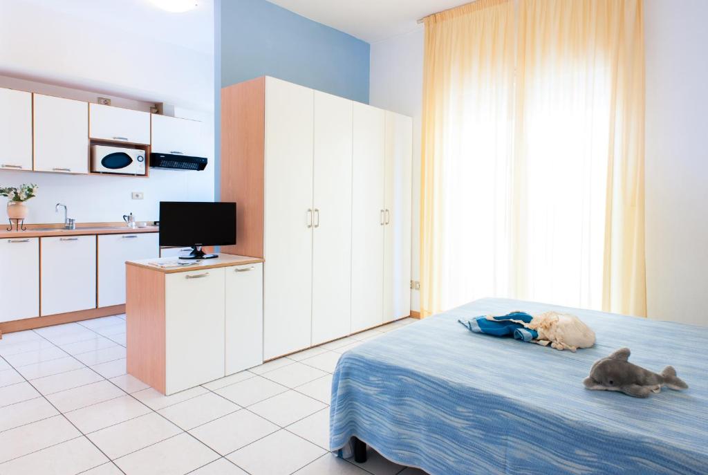 A kitchen or kitchenette at Welcome Residence per famiglie