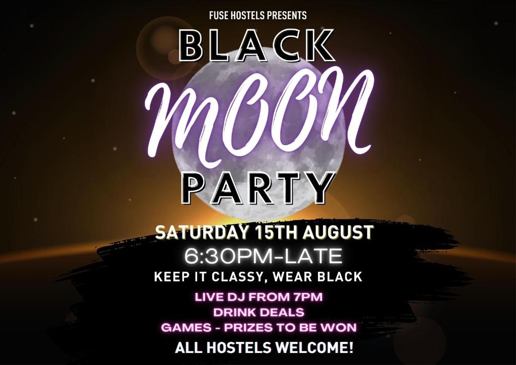 a black mardi gras party invitation with purple lights at Fuse Old Town Hoi An in Hoi An