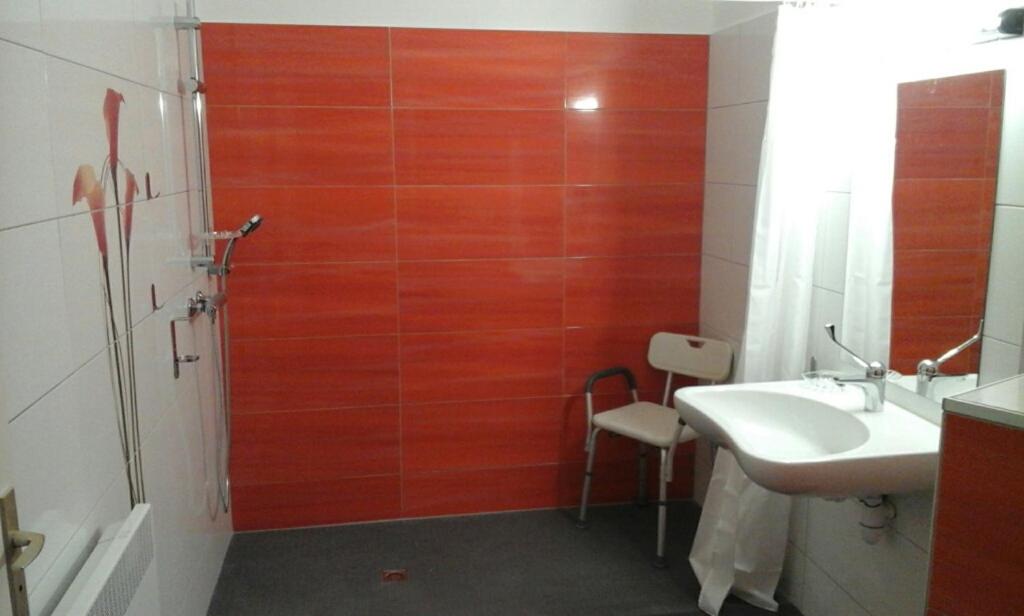 Koupelna v ubytování Hotel Pikassaria