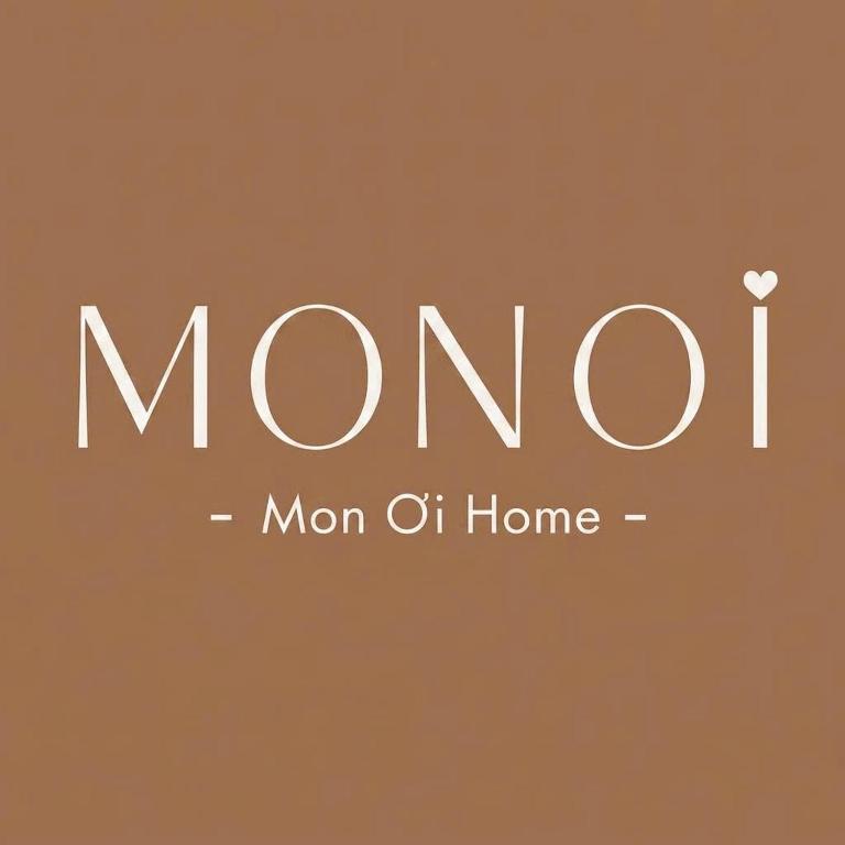 a sign that reads mom momof home at Monoi Home in Vinh