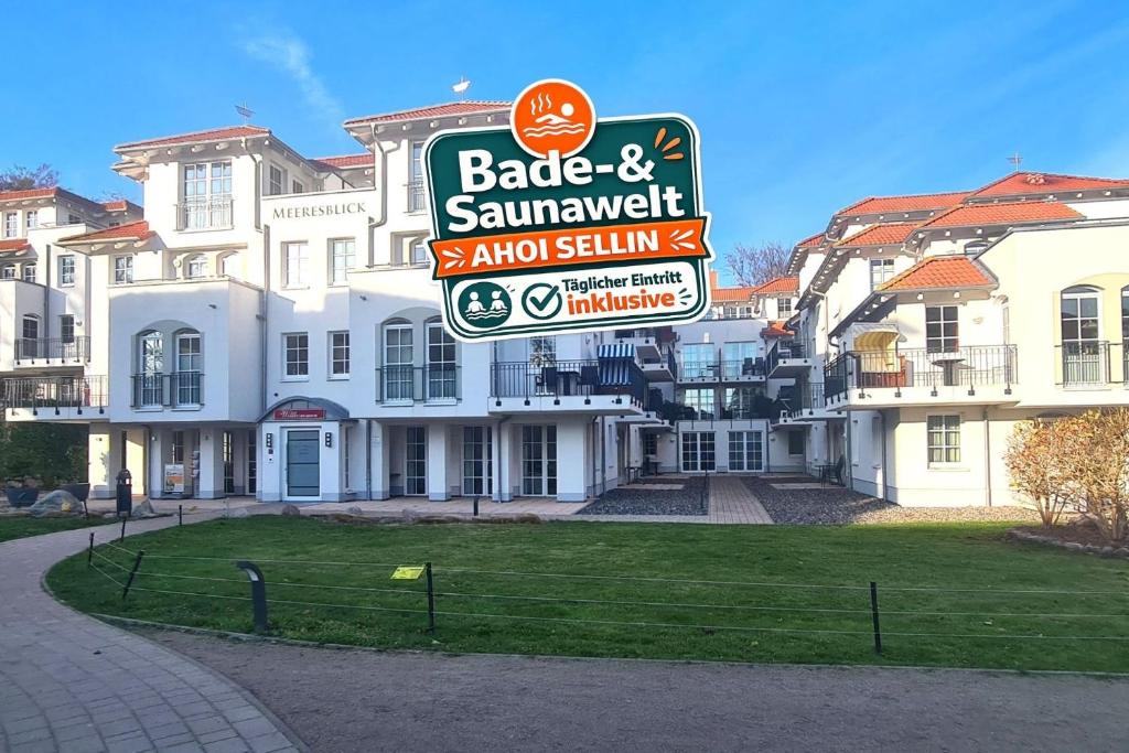 a sign in front of a large building at Sonnensegler - Bade- & Saunawelt täglich inklusive in Baabe