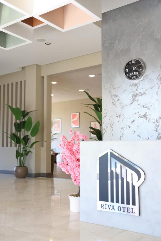 a lobby with a sign that reads riya office at Karasu Riva Otel in Karasu