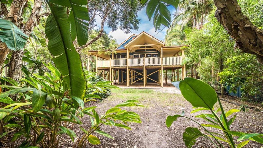 a house in the middle of a forest at MiaCasa in New Brighton