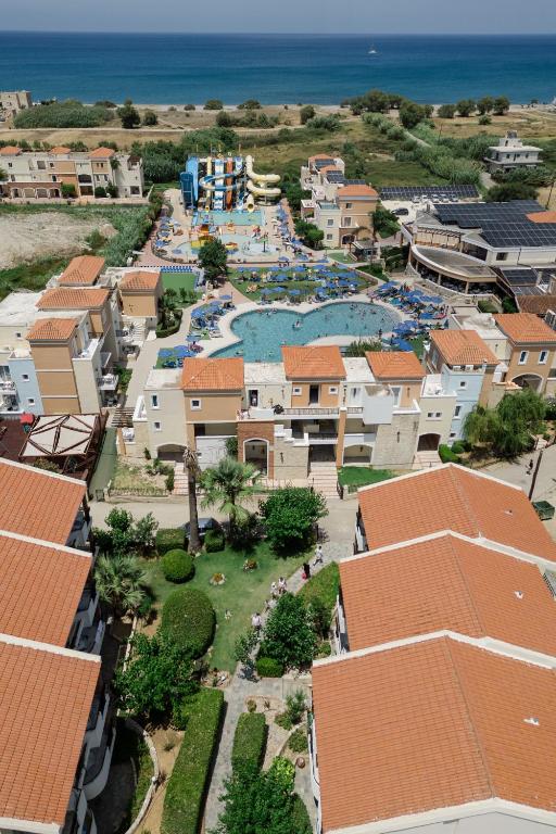 an aerial view of a pool at a resort at Chrispy Waterpark Resort - All inclusive in Kolymvari