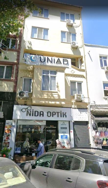a building with a nidomo outpost on a city street at Harun Fars in Yalova