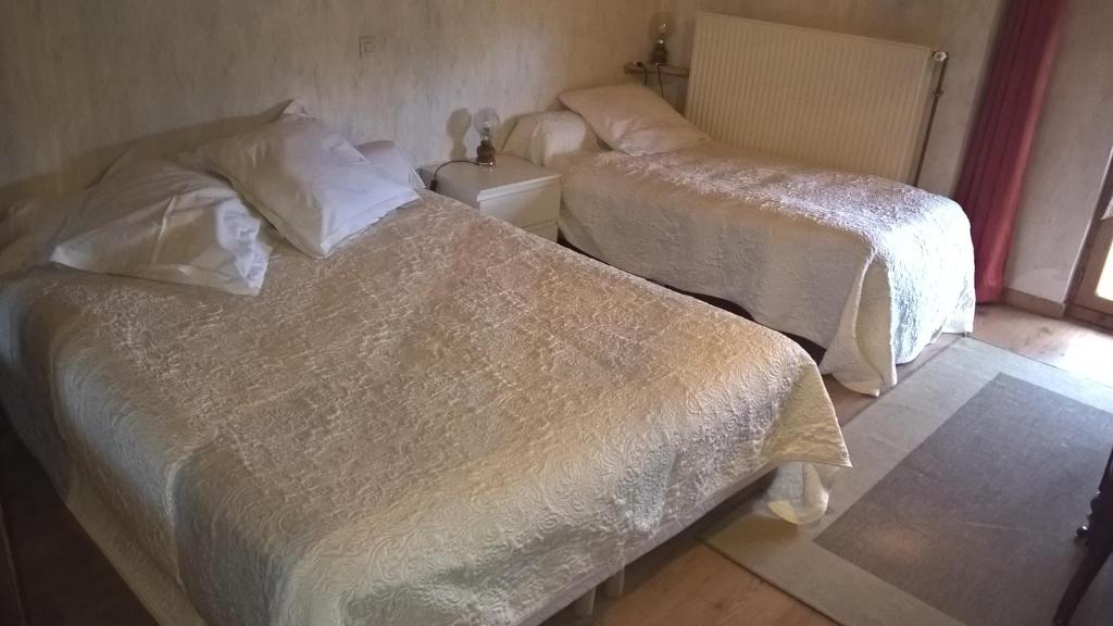 Postel nebo postele na pokoji v ubytování A la source du saolon