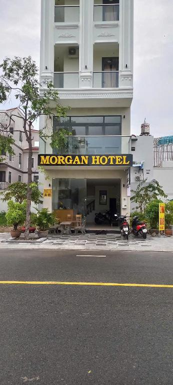 a mormon hotel on the side of a building at Morgan Hotel in Ấp Bình Hưng