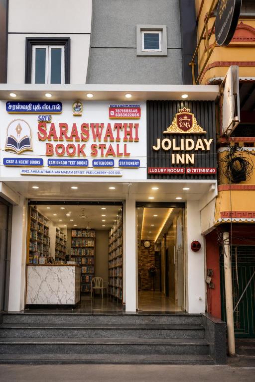 a book store with a sign for a bookshop at RMA Joliday Inn in Pondicherry