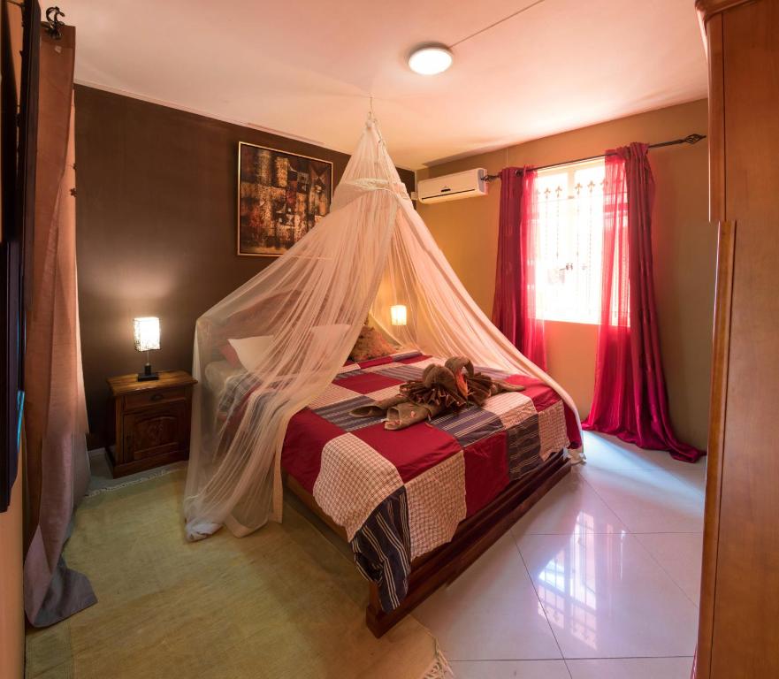 Postel nebo postele na pokoji v ubytování Blue Lagoon Villa