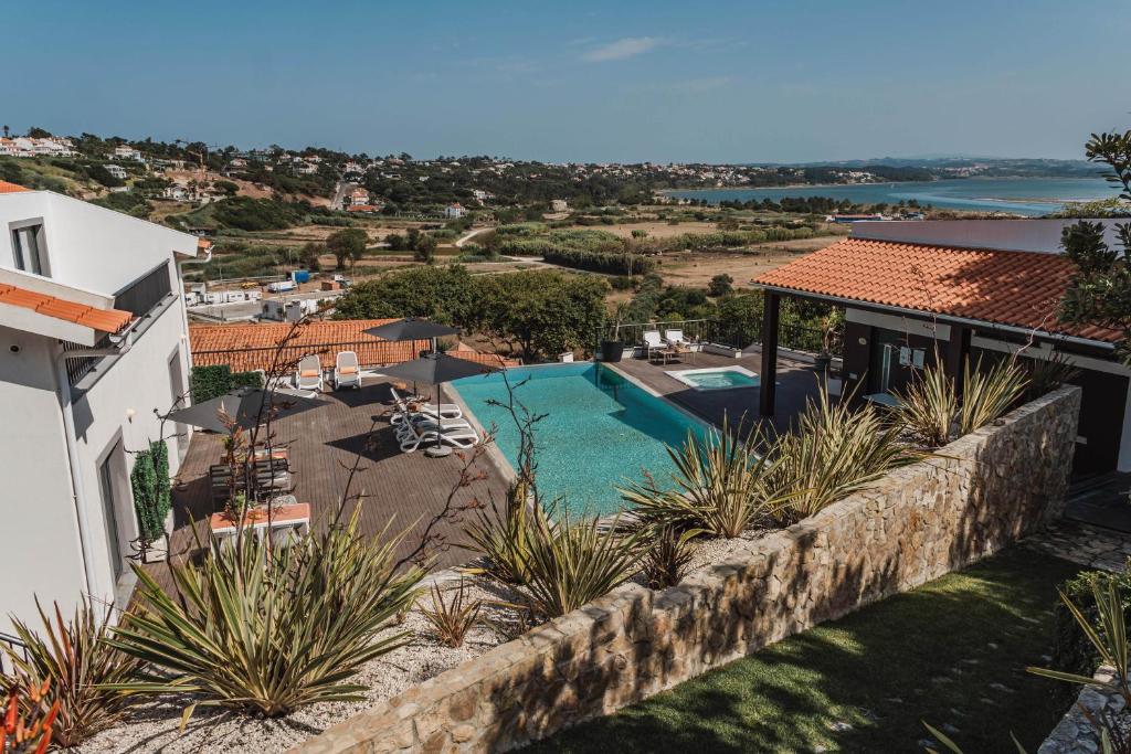 a view of a swimming pool from a house at Hillside House Residence in Foz do Arelho