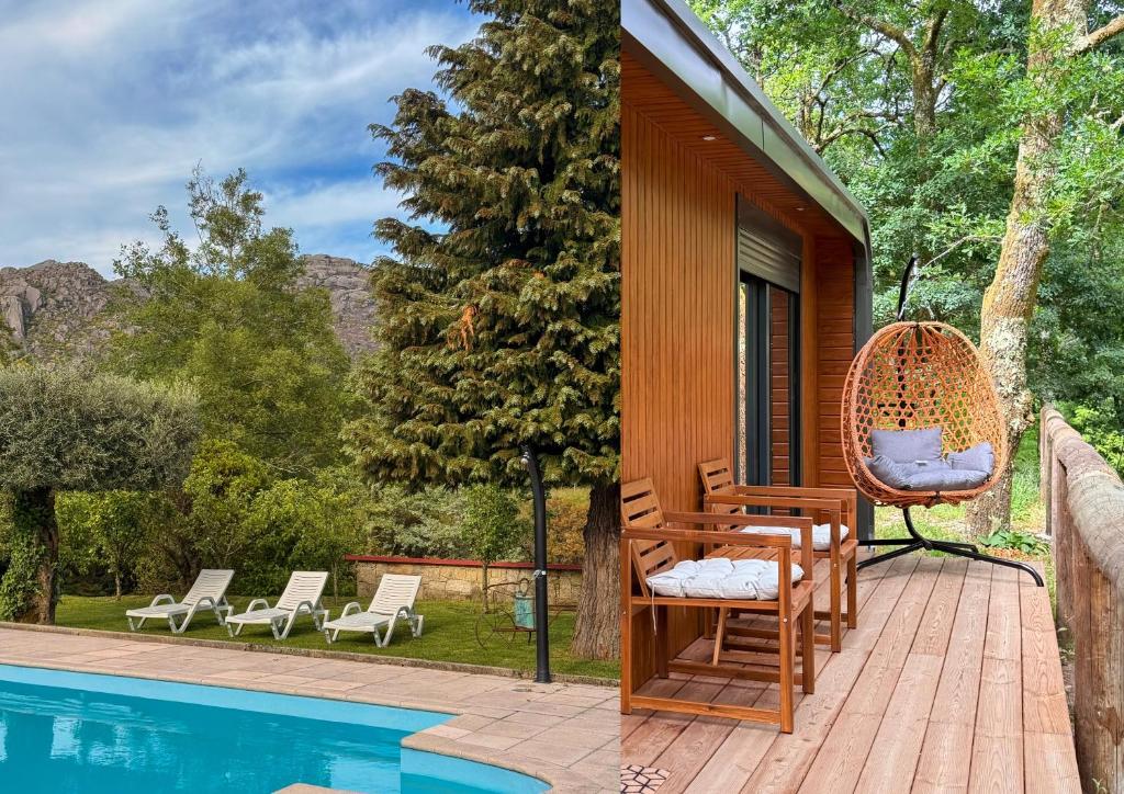 a house with a deck and a swimming pool at Outeiro do Moinho - Rooms & Bungalows in Campo do Gerês