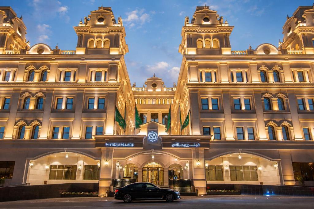 a car parked in front of a building at Vittori Palace Hotel and Residences in Riyadh