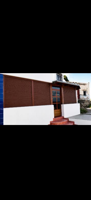 a small house with a brown and white at Dar Vista Mar in Tétouan