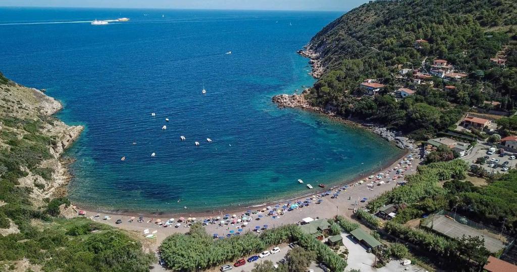 an aerial view of a beach with a group of people at Villaggio Turistico Sole e Mare in Nisporto