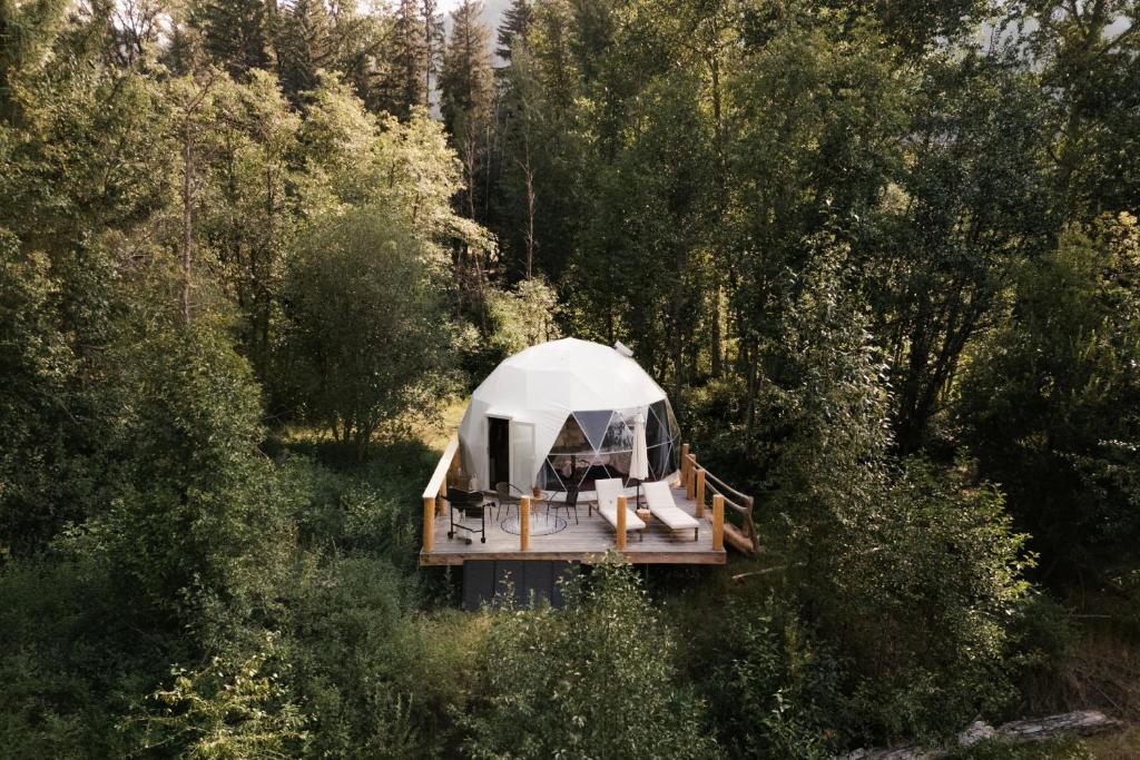 an aerial view of a tent in a forest at Woodland Creek in Chase