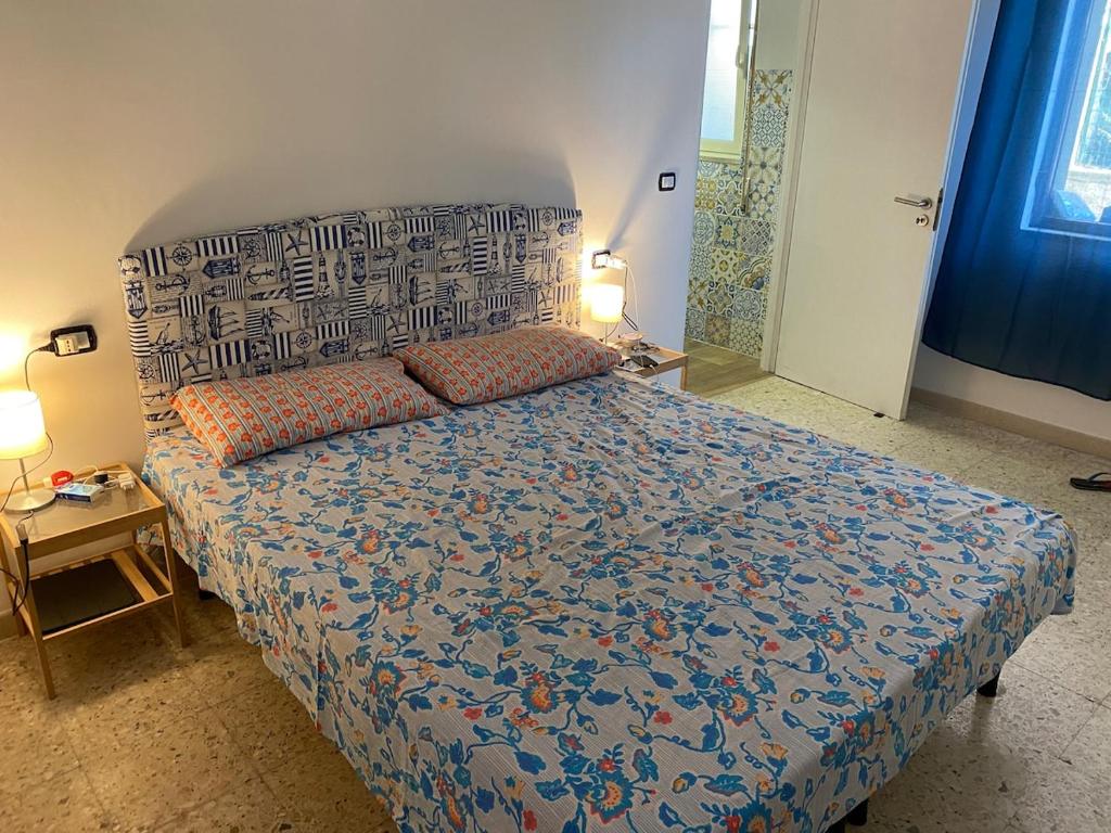 Postel nebo postele na pokoji v ubytování tra sila e mare