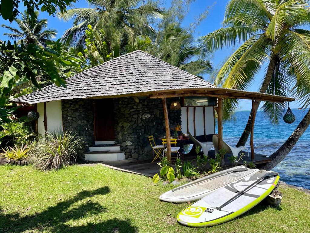 Bungalow sur la mer - hébergement à Tahiti