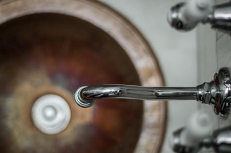 a close up of a bathroom sink with a metal faucet at Olmitos 3, Casa-Palacio Real Piedad in Cehegín