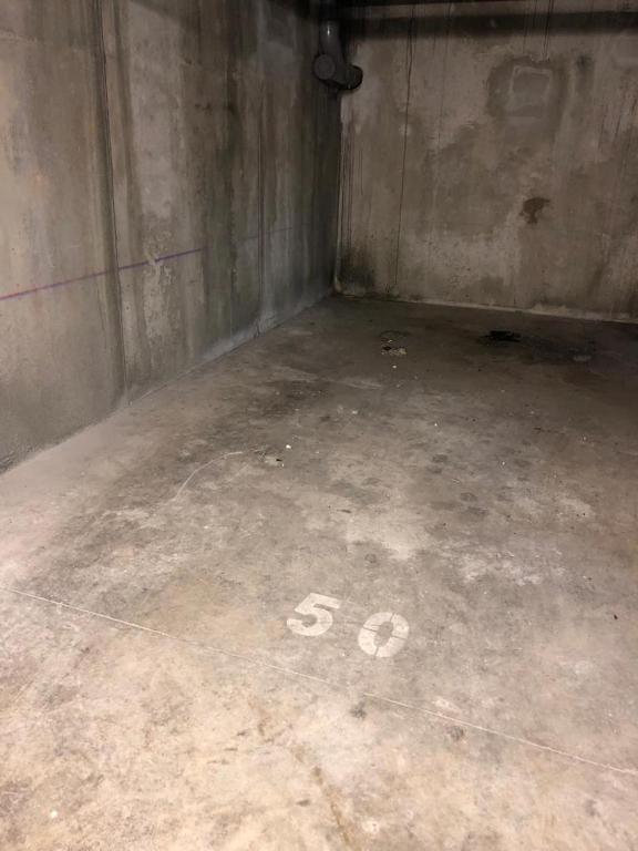an empty room with the number written on the floor at Le Rêve Bleu Grand Anse in Petite Île