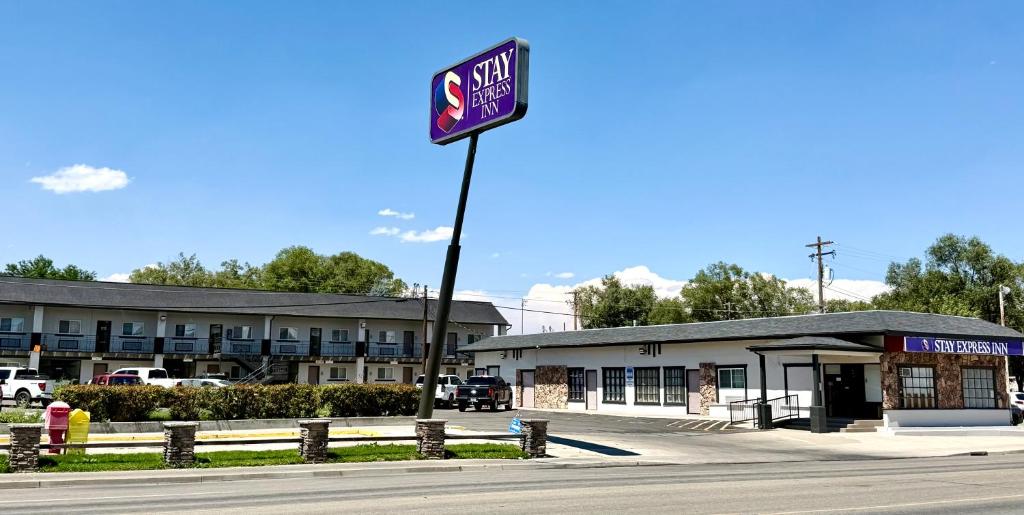 a street sign in front of a building at Stay Express Inn Elko in Elko