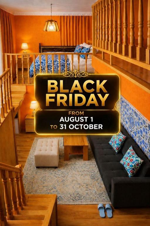 a large black friday sign in a living room at Hotel Chorminor 110 m to Old Town GET EARLY CHECK IN AND CHECK OUT in Bukhara