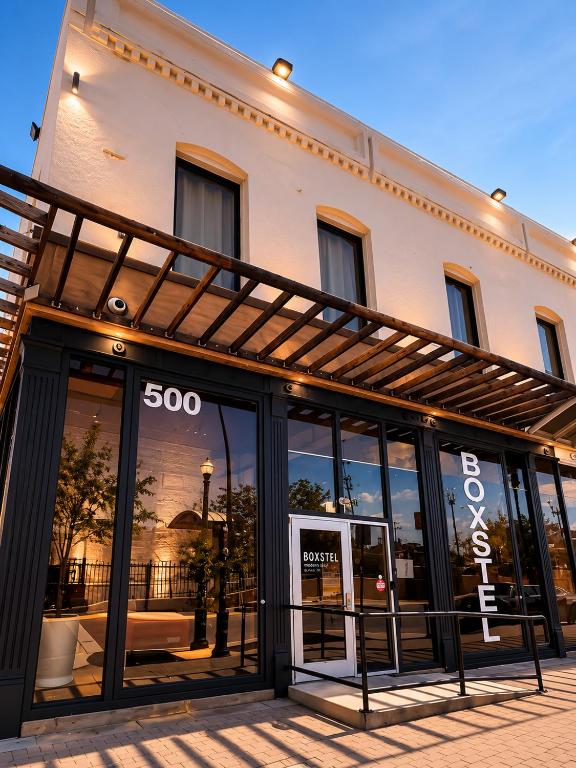 a store front of a building with glass windows at Boxstel - Modern Stay Hotel Downtown El Paso in El Paso