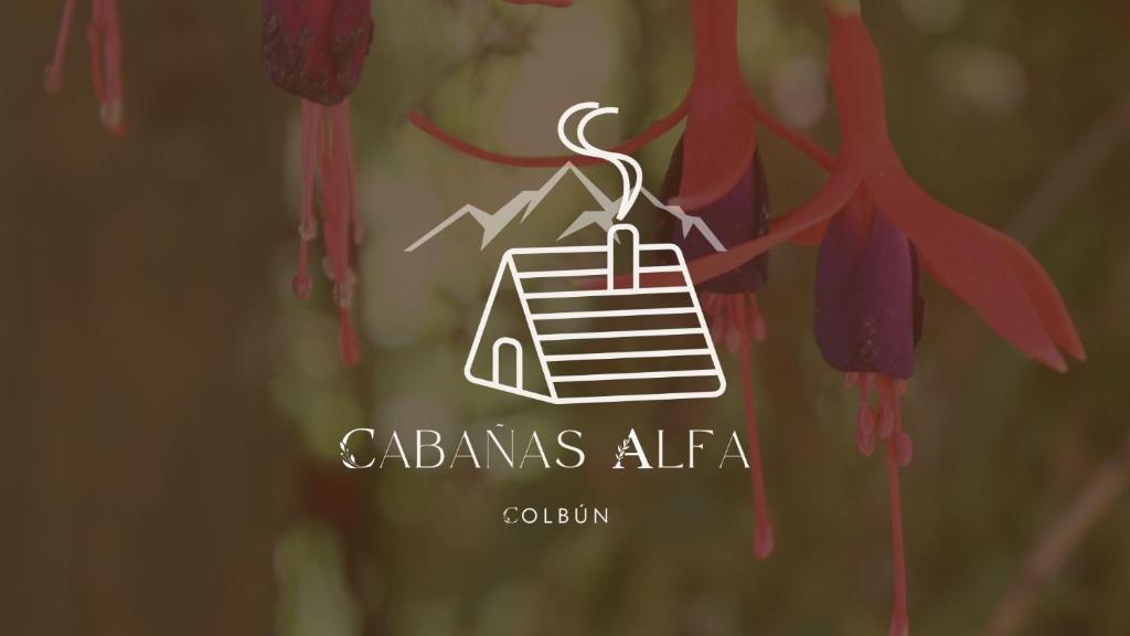 a sign that says adams alfa with a hanging object at Cabañas Alfa Colbun Machicura in Linares