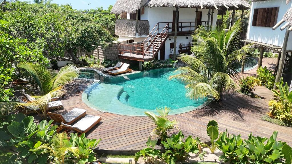 an aerial view of a resort with a swimming pool at Bali Atins in Atins