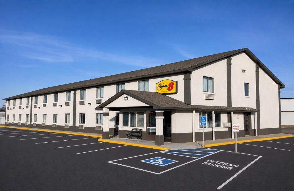 a rendering of a hotel with a parking lot at Super 8 by Wyndham Blackwell in Blackwell