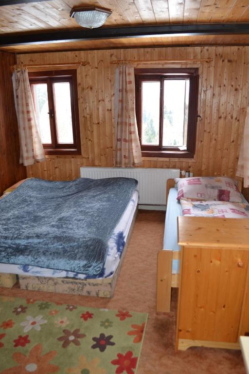 Postel nebo postele na pokoji v ubytování Guest House Leona