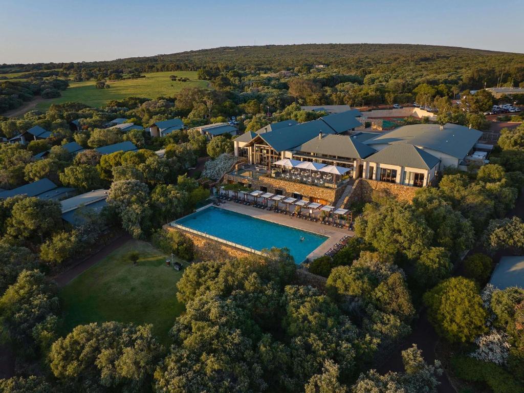an aerial view of a home with a swimming pool at Pullman Bunker Bay Resort Margaret River in Dunsborough