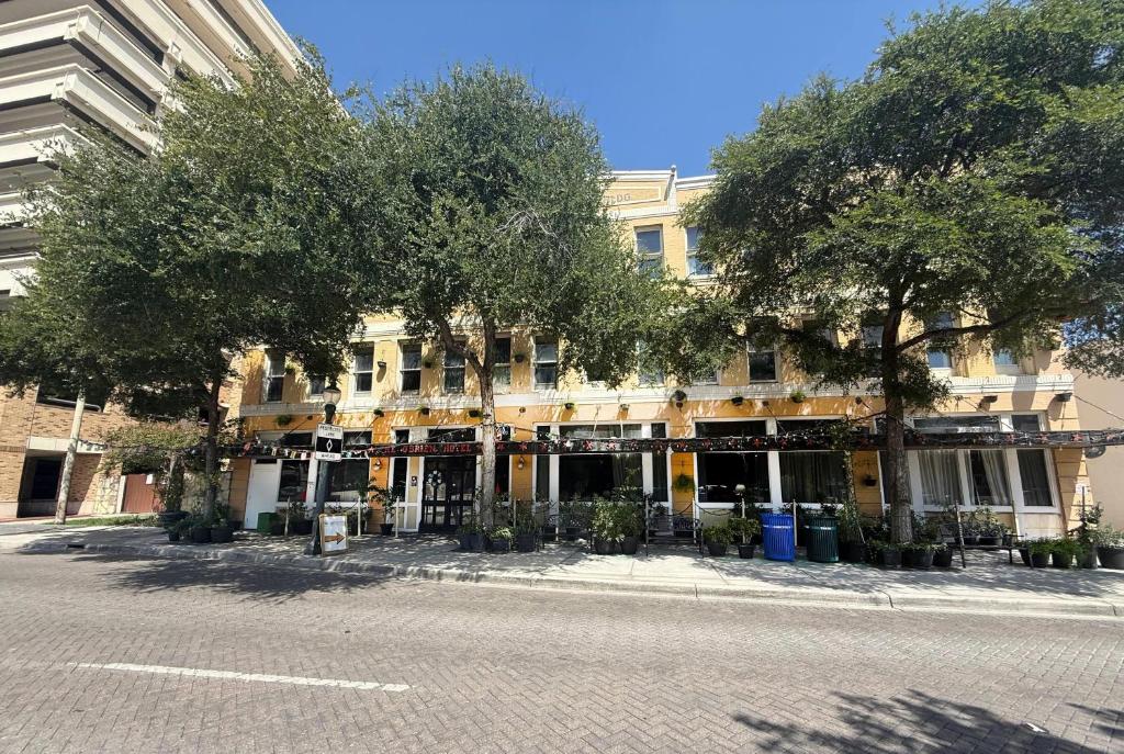 a building with trees in front of a street at The O'Brien Riverwalk Hotel, Trademark Collection by Wyndham in San Antonio